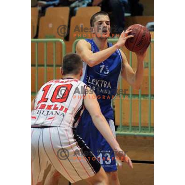 Jakob Cebasek of Parklji and Djordje Lelic of Elektra Sosatanj in action during basketball match Parklji-Elektra Sostanj in third round of Telemach league, played in SRC Jezica on October 29,2010 