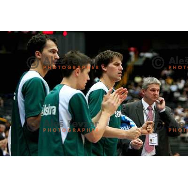 Zagorac, Lakovic, Jurak and coach Ales Pipan watching the action