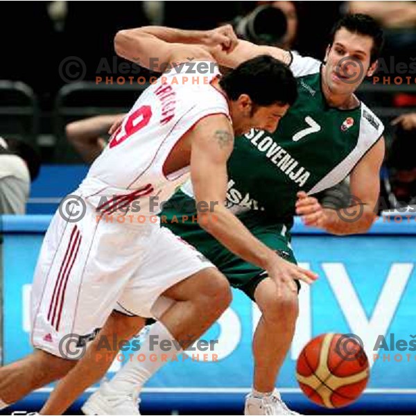Sani Becirovic tries to stop Serkan Erdogan