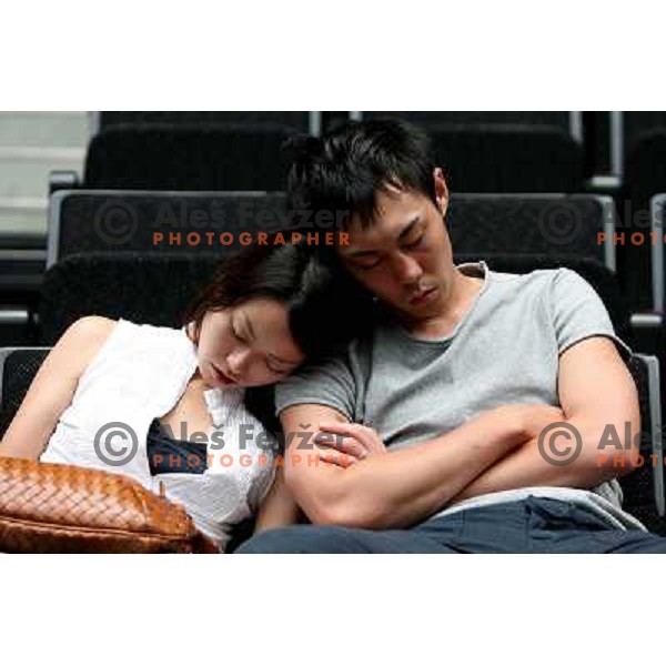 Japanese couple sleep in Saitama basketball arena