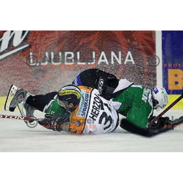 Tomi Mustonen of Tilia Olimpija and Herzog og Graz 99ersin action during ice-hockey match Tilia Olimpija- Graz 99ers in round 21 of EBEL league, played in Ljubljana, Slovenia on November 21, 2010 