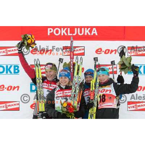 Anastasiya Kuzmina, Magdalena Neuner, Olga Zaitseva, Kaisa Mäkäräinen during E.On IBU World Cup Biathlon, Women Sprint on Pokljuka, Slovenia on December 18, 2010 