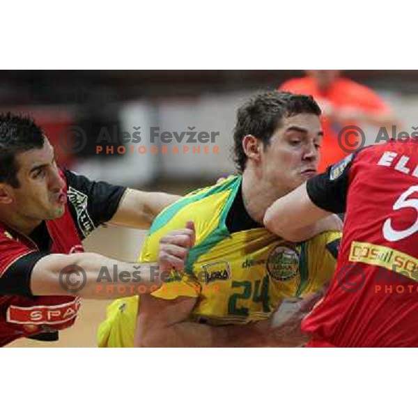 Janko Bozovic of RD Slovan and Marko Dujmovic of RD Loka in action during handball match RD Slovan-RD Loka in round 15 of 1.SLR, played at Kodeljevo Hall, Ljubljana, Slovenia on December 18, 2010 