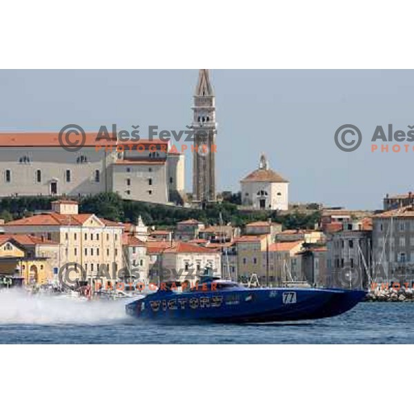 Team Victory 77 in front of Piran church