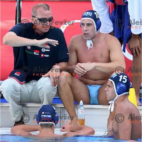 Zeljko Tonkovic talks to Jure Nastran (10), Martin Pus (15) and Andraz Verac