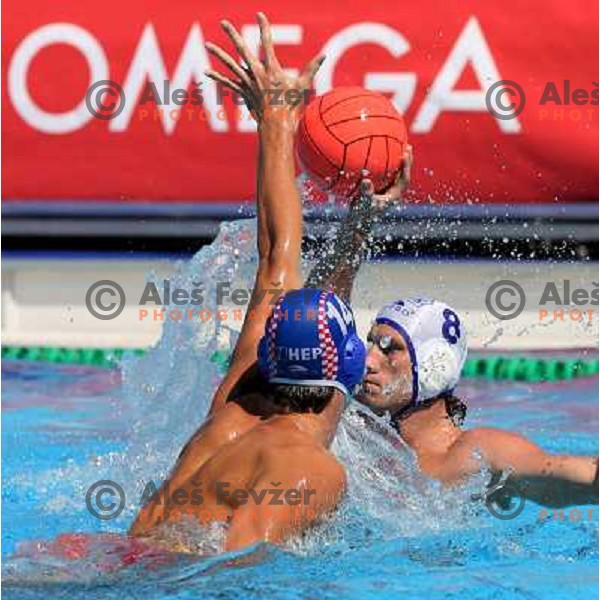 Maro Jokovic (14) guards Karol Baco (8)