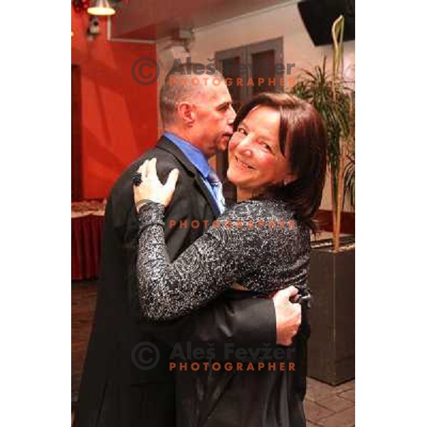 Rolando Pusnik , Marta Bon, head coach of handball club Krim Mercator during New Year\'s party in Bachus Center, Ljubljana, Slovenia on December 30,2010 