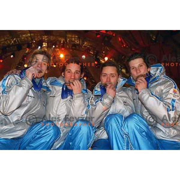 Robert Kranjec, Primoz Peterka, Damjan Fras, Peter Zonta of Slovenia with bronze olympic medal at team ski- jumping competition in Winter Olympic games in Salt Lake City, USA on February 2002 