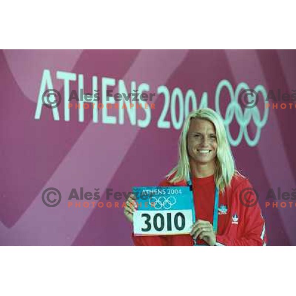 Tomo Popetru, Jolanda Ceplak and Roman Jakic of Slovenia after press conference for International media before qualifiaction at 800 meters at Summer Olympic games in Athens, Greece on August 19, 2004. 