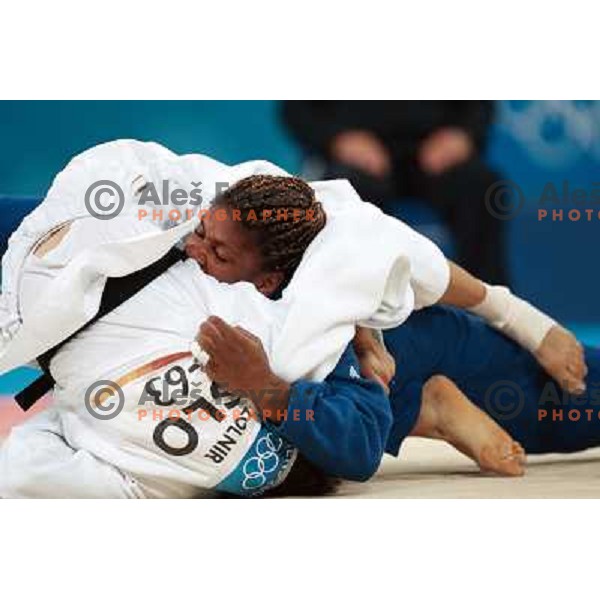 Urska Zolnir of Slovenia and Gonzalez of Cuba in action during judo tournament at Summer Olympic Games in Athens, Greece , August 2004. Zolnir competed in -63 category and won bronze olympic medal 