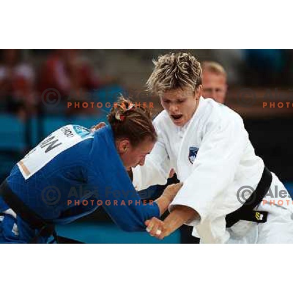 Urska Zolnir of Slovenia and Chisholm of Canada in action during judo tournament at Summer Olympic Games in Athens, Greece , August 2004. Zolnir competed in -63 category and won bronze olympic medal 
