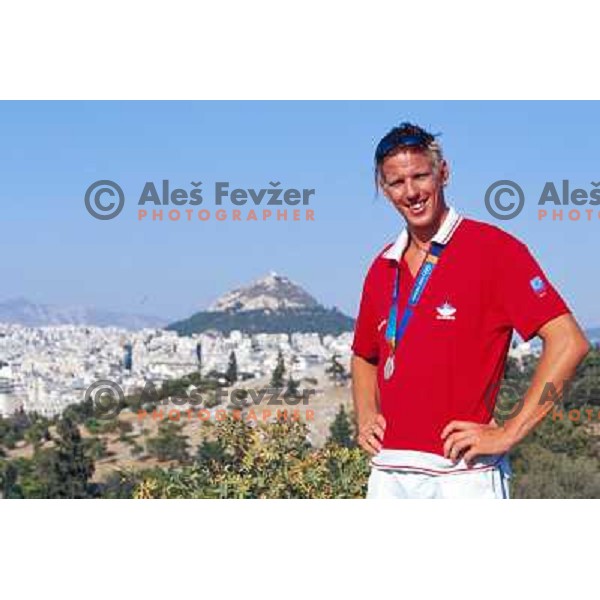 Luka Spik of Slovenia, silver medalist in rowing at Summer Olympic Games in Athens, Greece , August 2004 pictured in front of Acropolis 