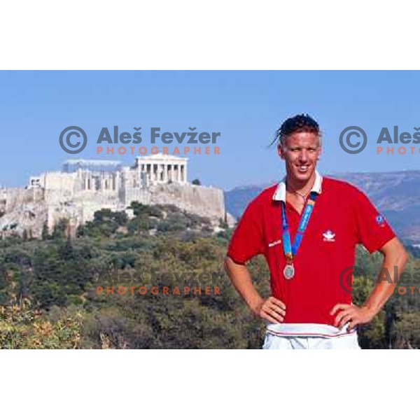 Luka Spik of Slovenia, silver medalist in rowing at Summer Olympic Games in Athens, Greece , August 2004 pictured in front of Acropolis 