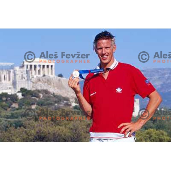 Luka Spik of Slovenia, silver medalist in rowing at Summer Olympic Games in Athens, Greece , August 2004 pictured in front of Acropolis 