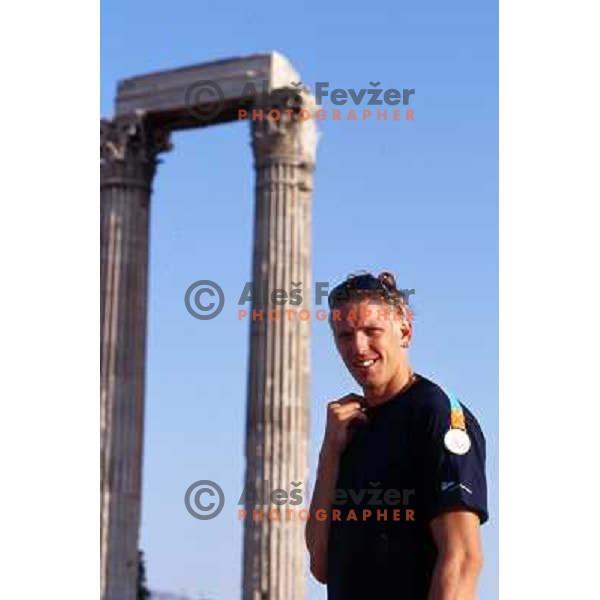 Luka Spik of Slovenia, silver medalist in rowing at Summer Olympic Games in Athens, Greece , August 2004 pictured in front of Acropolis 