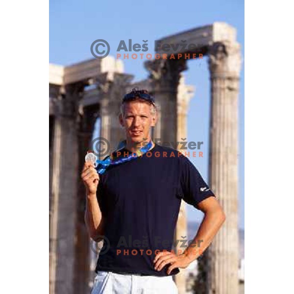 Luka Spik of Slovenia, silver medalist in rowing at Summer Olympic Games in Athens, Greece , August 2004 pictured in front of Acropolis 