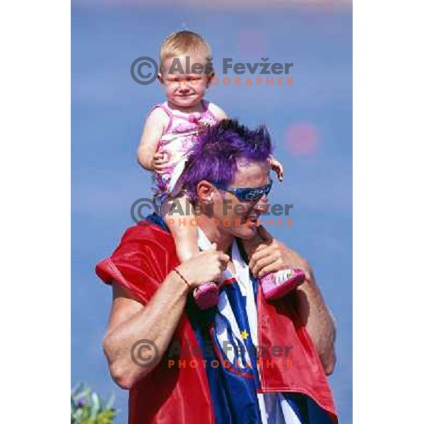 Iztok Cop of Slovenia, silver medalist in rowing at Summer Olympic Games in Athens, Greece , August 2004 pictured with his daughter Ruby 