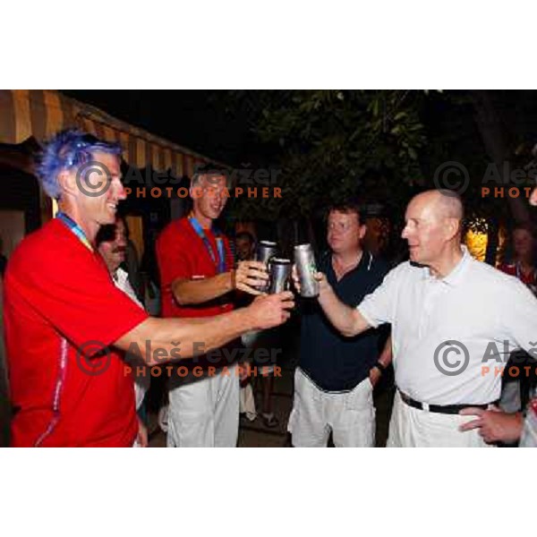 Iztok Cop and Luka Spik of Slovenia, silver medalists in rowing at Summer Olympic Games in Athens, Greece , August 2004 during reception for sponsors and press in Slovenia house pictured with Bosko Srot and Tone Turnsek 