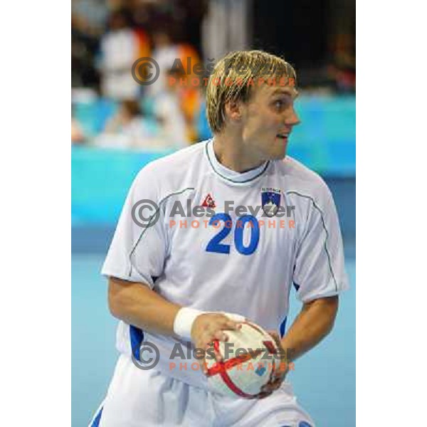 Luka Zvizej of Slovenia in action during Handball tournament at Summer Olympic Games Athens 2004, Greece. Slovenia played with Russia on August 13, 2004 