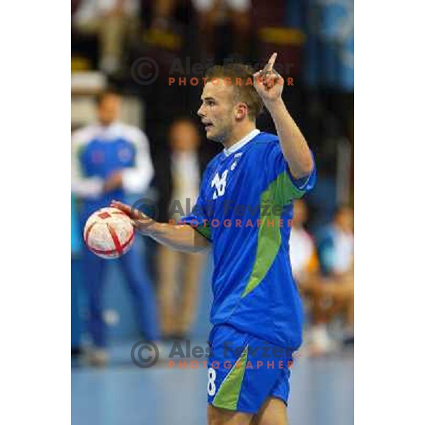 Uros Zorman of Slovenia in action during Handball tournament at Summer Olympic Games Athens 2004, Greece. Slovenia played with Croatia on August 15, 2004 
