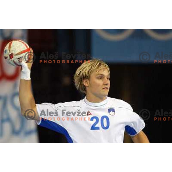 Luka Zvizej of Slovenia in action during Handball tournament at Summer Olympic Games Athens 2004, Greece. Slovenia played with Iceland on August 18, 2004 