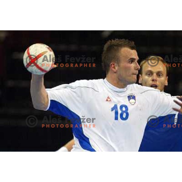 Uros Zorman of Slovenia in action during Handball tournament at Summer Olympic Games Athens 2004, Greece. Slovenia played with Iceland on August 18, 2004 
