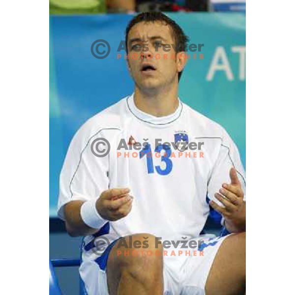 Tomaz Tomsic of Slovenia in action during Handball tournament at Summer Olympic Games Athens 2004, Greece. Slovenia played with Iceland on August 18, 2004 