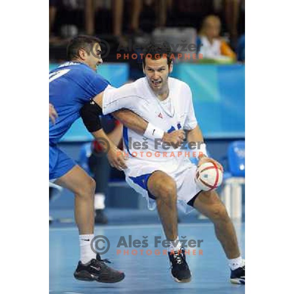 Renato Vugrinec of Slovenia in action during Handball tournament at Summer Olympic Games Athens 2004, Greece. Slovenia played with Iceland on August 18, 2004 