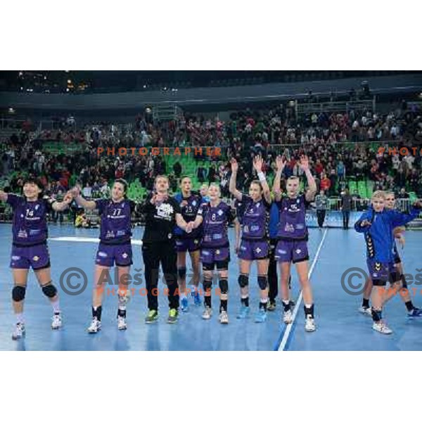 Krim players celebrate victory at the handball game RK Krim Mercator Ljubljana - Itxako Reyno De Navarra , played in the Women\'s EHF Champions league main round, 05.02.2011 , Stozice Arena, Ljubljana, 