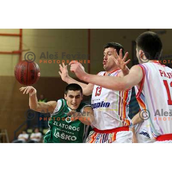 Matej Krusic of Geoplin Slovan and Vladimir Panic of Zlatorog in action during basketball match in quarter-final of Spar Cup, played in Poden Sports Hall, Skofja Loka, Slovenia on Feburary 11, 2011 
