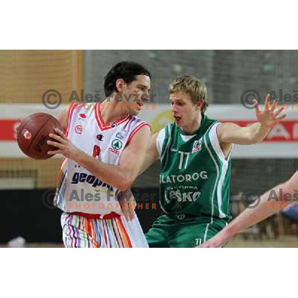 Miha Fon of Geoplin Slovan and Maj Kovacevic in action during basketball match in quarter-final of Spar Cup, played in Poden Sports Hall, Skofja Loka, Slovenia on Feburary 11, 2011 