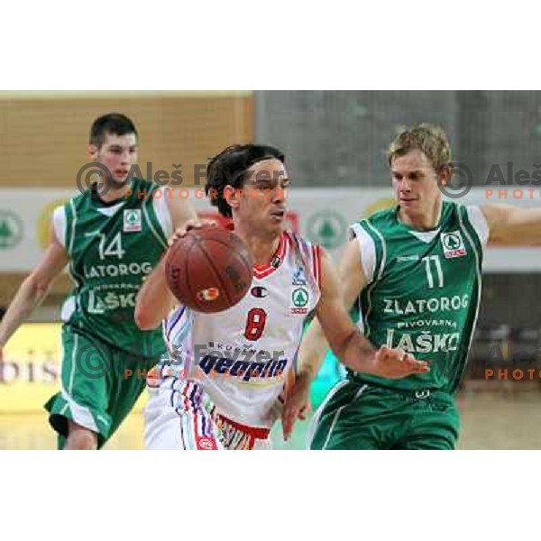 Miha Fon of Geoplin Slovan and Maj Kovacevic in action during basketball match in quarter-final of Spar Cup, played in Poden Sports Hall, Skofja Loka, Slovenia on Feburary 11, 2011 