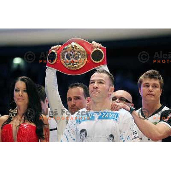 Dejan Zavec of Slovenia (blue trunks) IBF World Boxing Champion successfully defend his walterweight title with technical knockout (TKO) in fifth round against Paul Delgado of USA (white trunks) in front of 13.000 fans in Stozice, Ljubljana, Slovenia on F