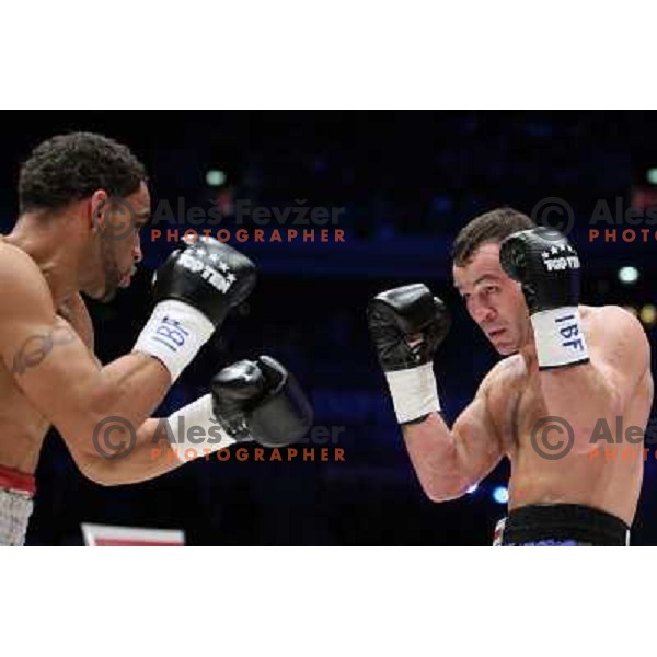 Dejan Zavec of Slovenia (blue trunks) IBF World Boxing Champion successfully defend his walterweight title with technical knockout (TKO) in fifth round against Paul Delgado of USA (white trunks) in front of 13.000 fans in Stozice, Ljubljana, Slovenia on F