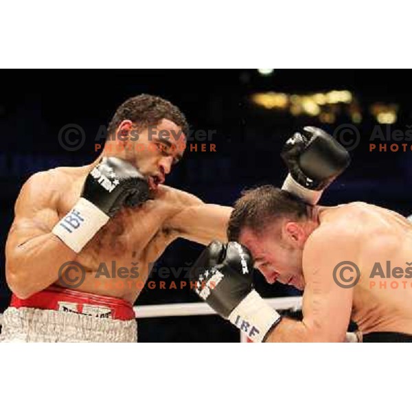 Dejan Zavec of Slovenia (blue trunks) IBF World Boxing Champion successfully defend his walterweight title with technical knockout (TKO) in fifth round against Paul Delgado of USA (white trunks) in front of 13.000 fans in Stozice, Ljubljana, Slovenia on F