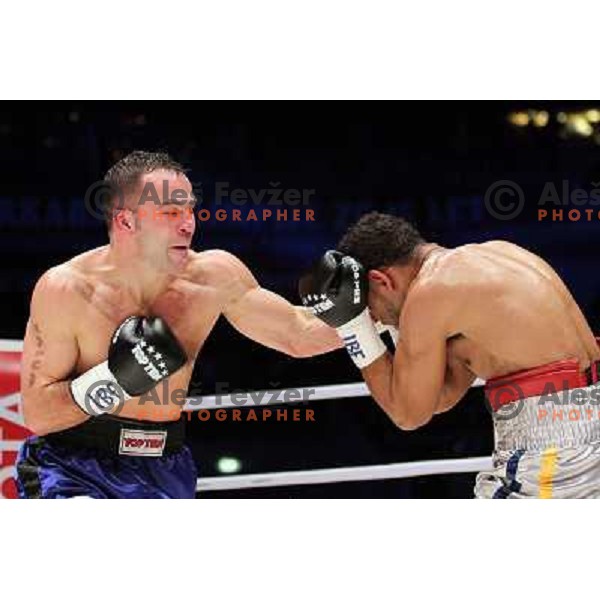 Dejan Zavec of Slovenia (blue trunks) IBF World Boxing Champion successfully defend his walterweight title with technical knockout (TKO) in fifth round against Paul Delgado of USA (white trunks) in front of 13.000 fans in Stozice, Ljubljana, Slovenia on F
