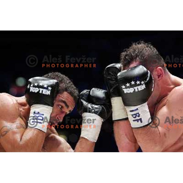 Dejan Zavec of Slovenia (blue trunks) IBF World Boxing Champion successfully defend his walterweight title with technical knockout (TKO) in fifth round against Paul Delgado of USA (white trunks) in front of 13.000 fans in Stozice, Ljubljana, Slovenia on F