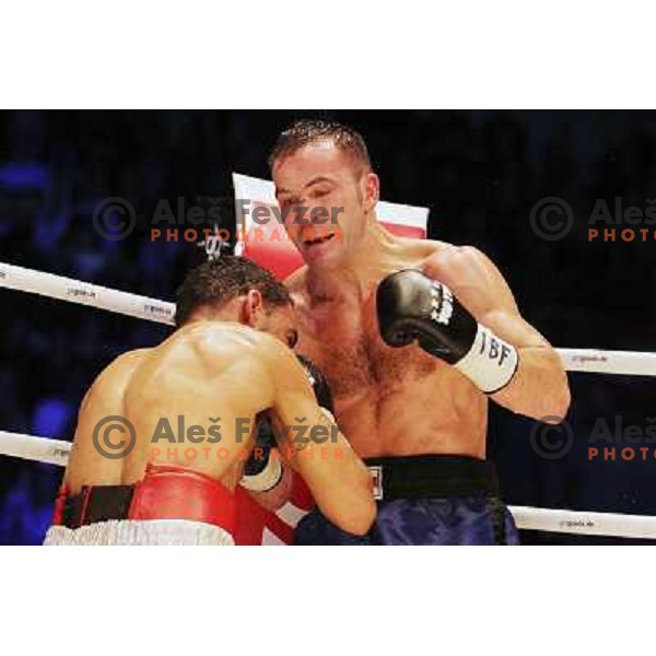 Dejan Zavec of Slovenia (blue trunks) IBF World Boxing Champion successfully defend his walterweight title with technical knockout (TKO) in fifth round against Paul Delgado of USA (white trunks) in front of 13.000 fans in Stozice, Ljubljana, Slovenia on F