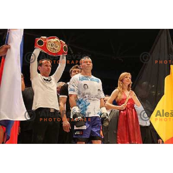 Dejan Zavec of Slovenia (blue trunks) IBF World Boxing Champion successfully defend his walterweight title with technical knockout (TKO) in fifth round against Paul Delgado of USA (white trunks) in front of 13.000 fans in Stozice, Ljubljana, Slovenia on F
