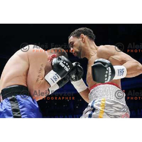 Dejan Zavec of Slovenia (blue trunks) IBF World Boxing Champion successfully defend his walterweight title with technical knockout (TKO) in fifth round against Paul Delgado of USA (white trunks) in front of 13.000 fans in Stozice, Ljubljana, Slovenia on F