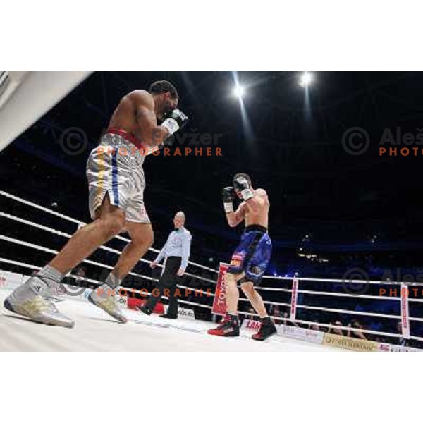 Dejan Zavec of Slovenia (blue trunks) IBF World Boxing Champion successfully defend his walterweight title with technical knockout (TKO) in fifth round against Paul Delgado of USA (white trunks) in front of 13.000 fans in Stozice, Ljubljana, Slovenia on F