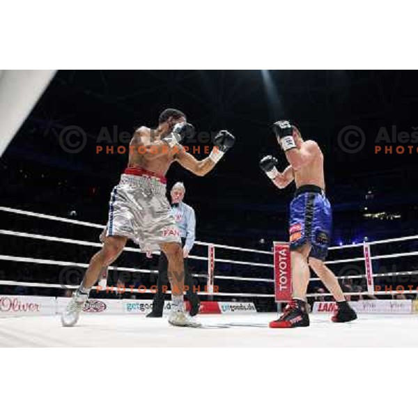 Dejan Zavec of Slovenia (blue trunks) IBF World Boxing Champion successfully defend his walterweight title with technical knockout (TKO) in fifth round against Paul Delgado of USA (white trunks) in front of 13.000 fans in Stozice, Ljubljana, Slovenia on F