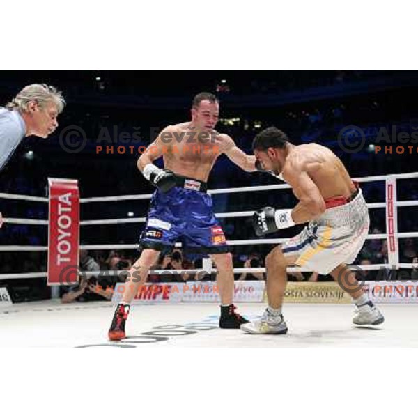Dejan Zavec of Slovenia (blue trunks) IBF World Boxing Champion successfully defend his walterweight title with technical knockout (TKO) in fifth round against Paul Delgado of USA (white trunks) in front of 13.000 fans in Stozice, Ljubljana, Slovenia on F