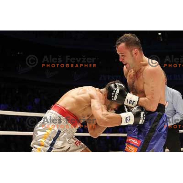 Dejan Zavec of Slovenia (blue trunks) IBF World Boxing Champion successfully defend his walterweight title with technical knockout (TKO) in fifth round against Paul Delgado of USA (white trunks) in front of 13.000 fans in Stozice, Ljubljana, Slovenia on F