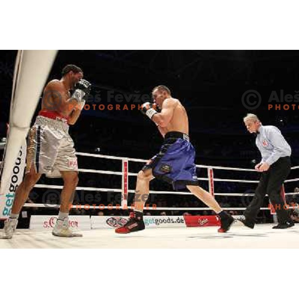 Dejan Zavec of Slovenia (blue trunks) IBF World Boxing Champion successfully defend his walterweight title with technical knockout (TKO) in fifth round against Paul Delgado of USA (white trunks) in front of 13.000 fans in Stozice, Ljubljana, Slovenia on F