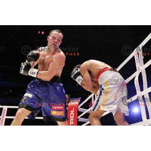 Dejan Zavec of Slovenia (blue trunks) IBF World Boxing Champion successfully defend his walterweight title with technical knockout (TKO) in fifth round against Paul Delgado of USA (white trunks) in front of 13.000 fans in Stozice, Ljubljana, Slovenia on F