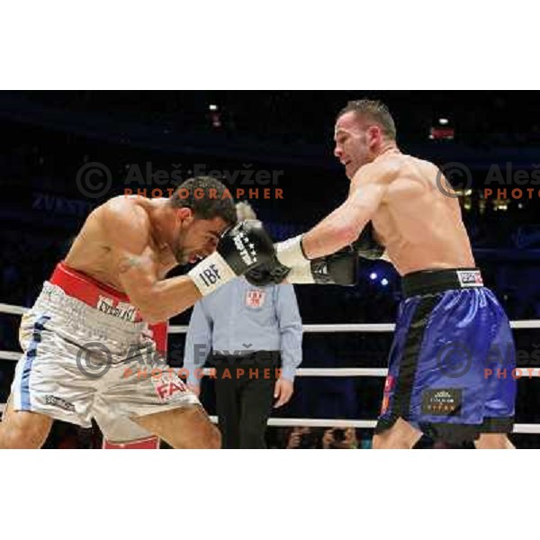 Dejan Zavec of Slovenia (blue trunks) IBF World Boxing Champion successfully defend his walterweight title with technical knockout (TKO) in fifth round against Paul Delgado of USA (white trunks) in front of 13.000 fans in Stozice, Ljubljana, Slovenia on F