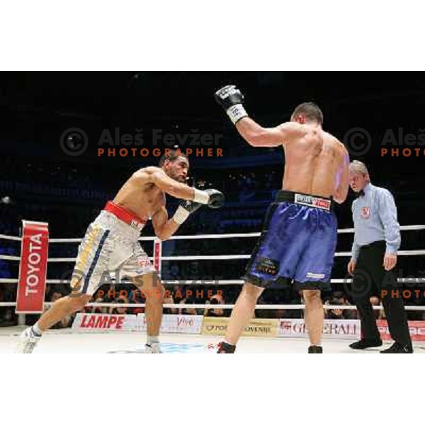 Dejan Zavec of Slovenia (blue trunks) IBF World Boxing Champion successfully defend his walterweight title with technical knockout (TKO) in fifth round against Paul Delgado of USA (white trunks) in front of 13.000 fans in Stozice, Ljubljana, Slovenia on F