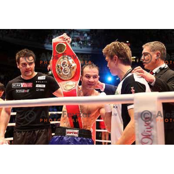Dejan Zavec of Slovenia (blue trunks) IBF World Boxing Champion successfully defend his walterweight title with technical knockout (TKO) in fifth round against Paul Delgado of USA (white trunks) in front of 13.000 fans in Stozice, Ljubljana, Slovenia on F