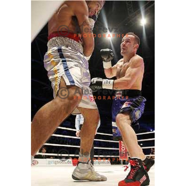 Dejan Zavec of Slovenia (blue trunks) IBF World Boxing Champion successfully defend his walterweight title with technical knockout (TKO) in fifth round against Paul Delgado of USA (white trunks) in front of 13.000 fans in Stozice, Ljubljana, Slovenia on F